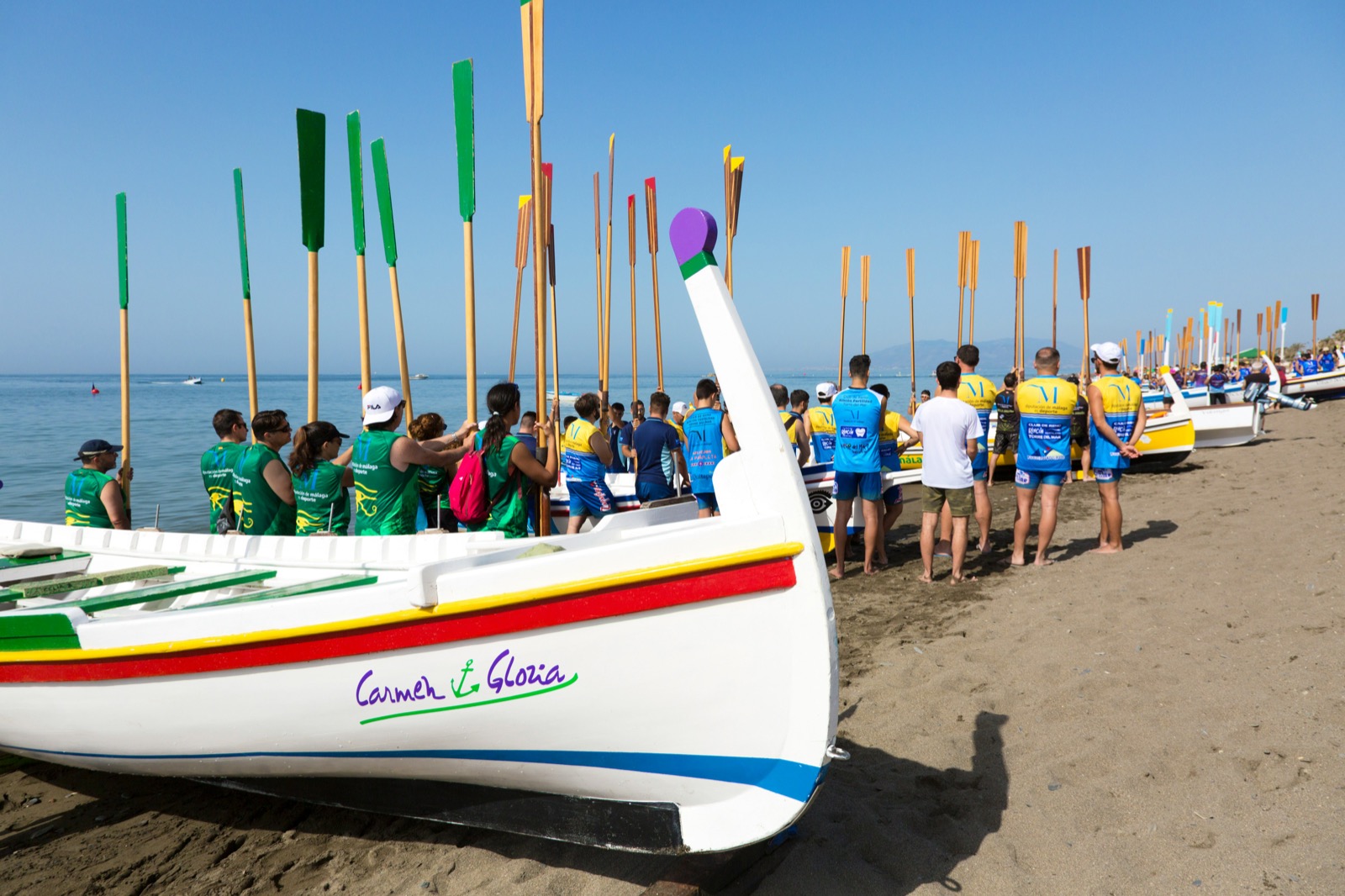 Community rowing together representing aligned philanthropic strategy and shared direction
